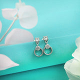 Silver Dangling Solitaire Earrings