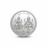 Silver coin with Laxmi Ganesh