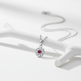 Silver necklace with a pendant on a white background