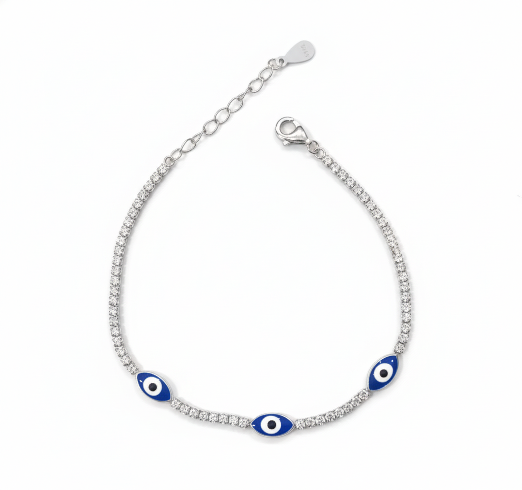 Silver bracelet with blue evil eye charms on a white background