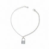 Silver chain bracelet with a padlock charm on a white background