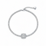 Silver bracelet with a central diamond on a white background