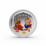 Decorative coin with colorful figures and text on a white background