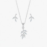 Silver leaf-shaped necklace and earrings on a white background