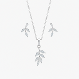 Silver leaf-shaped necklace and earrings on a white background